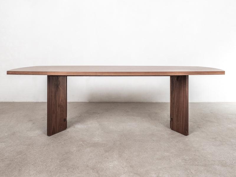 natural wood dining table in walnut